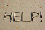 Help written on beach Simon Howden - freedigitalphotos.net