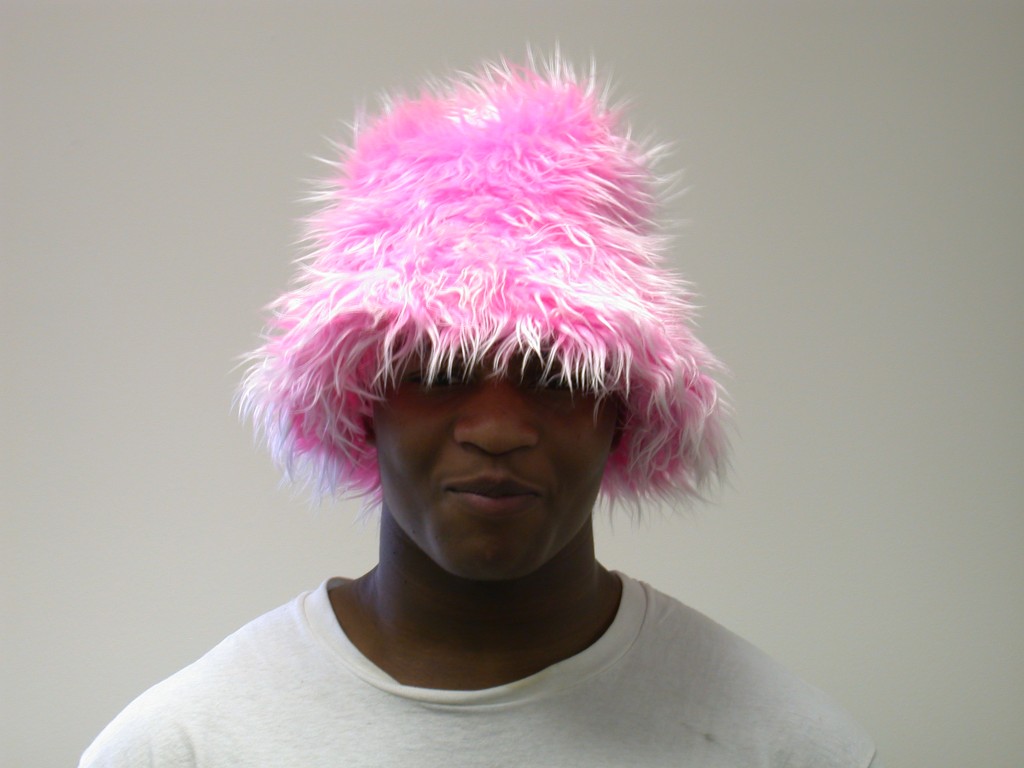 Man with pink Fluffy hat to show the kind of stuff you can get at Belfast Friendship Club Megaswap, and what a fun event it is! 
