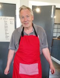 Paul modelling our Big Lunch volunteer apron