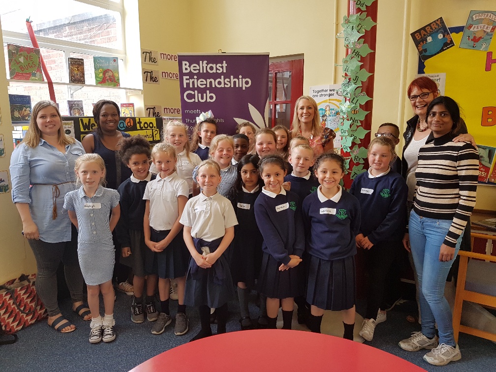 Small Worlds hosts with pupils from Northern Ireland's first School of Sanctuary Blythefield Primary School and their teacher